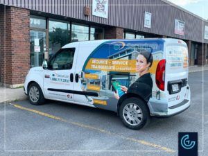 Partial vehicle wrap and lettering on the van 2015 Dodge RAM ProMaster City for the security service provider Securium