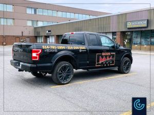 Lettrage de véhicule sur 2020 Ford F150 Extended Cab Standard Bed pour la compagnie de construction civile Groupe M.N.M.