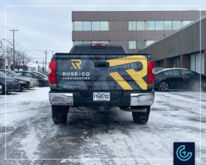Vehicle wrap and lettering on a pick-up truck 2019 Toyota Tundra SR5 Crew Cab for RUSS+Co Construction.
