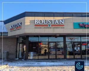 Backlit storefront sign in channel letters for the restaurant Boustan in DDO