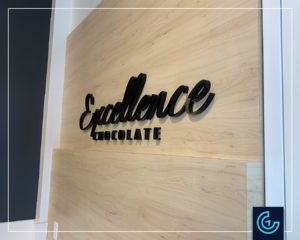 Wall sign letters in acrylic for the store of Excellence Chocolate