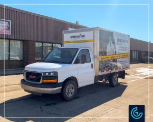 Truck wrap on a 2020 GMC Savana with a 10-foot cargo box for Structure Tone Environmental Corp.
