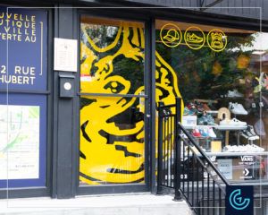 Storefront window graphic for the footwear boutique Mile End Kick (Avenue du Parc)