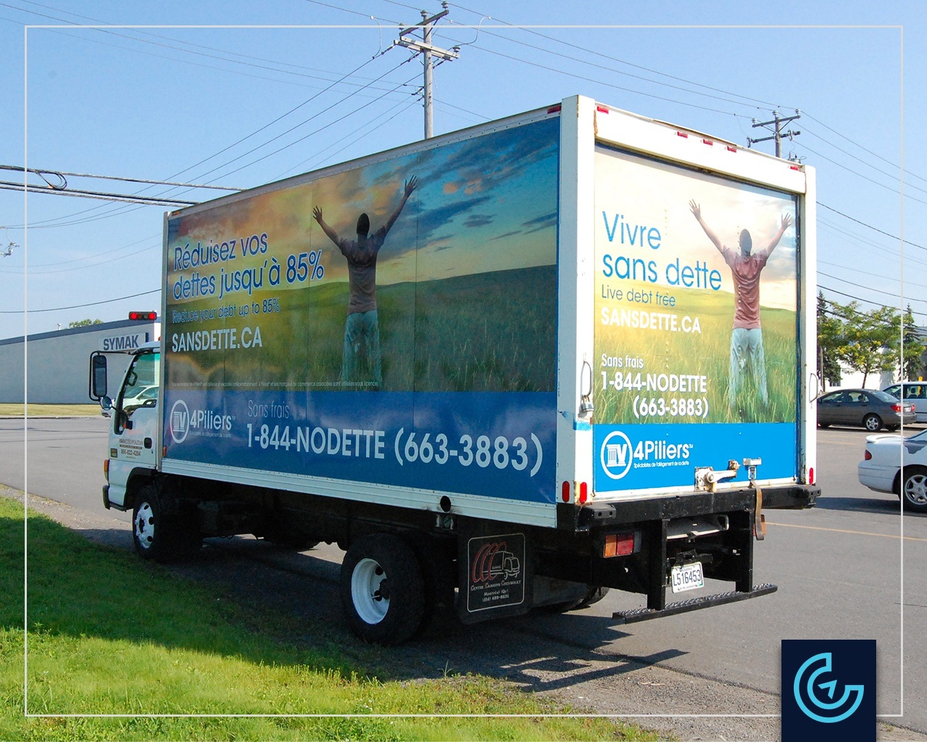 Wrap de cube camion sur un camion GMC 4500 avec une cube cargo de 10 pieds pour 4Piliers
