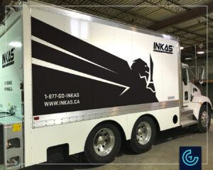Vehicle lettering on an armor truck for the security services group INKAS