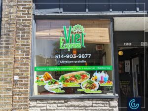 Advertising storefront window graphics designed, printed and installed for the Vietnamese sandwich store Viet Expression in Verdun.