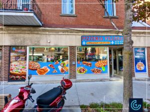 Advertising storefront window graphics designed, printed and installed for the pizza parlor Pizzeria Villeray.