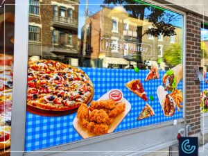 Advertising storefront window graphics designed, printed and installed for the pizza parlor Pizzeria Villeray.