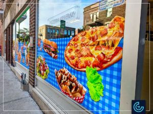 Advertising storefront window graphics designed, printed and installed for the pizza parlor Pizzeria Villeray.