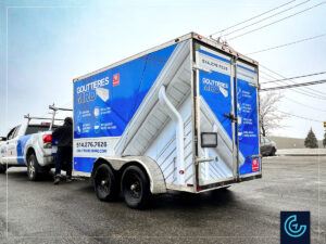 Trailer wrap on a 12-foot enclosed trailer for the gutter installation and reparation service Gouttières MRO.