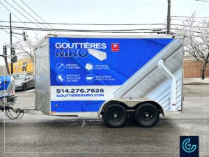 Trailer wrap on a 12-foot enclosed trailer for the gutter installation and reparation service Gouttières MRO.