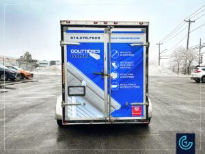 Trailer wrap on a 12-foot enclosed trailer for the gutter installation and reparation service Gouttières MRO.