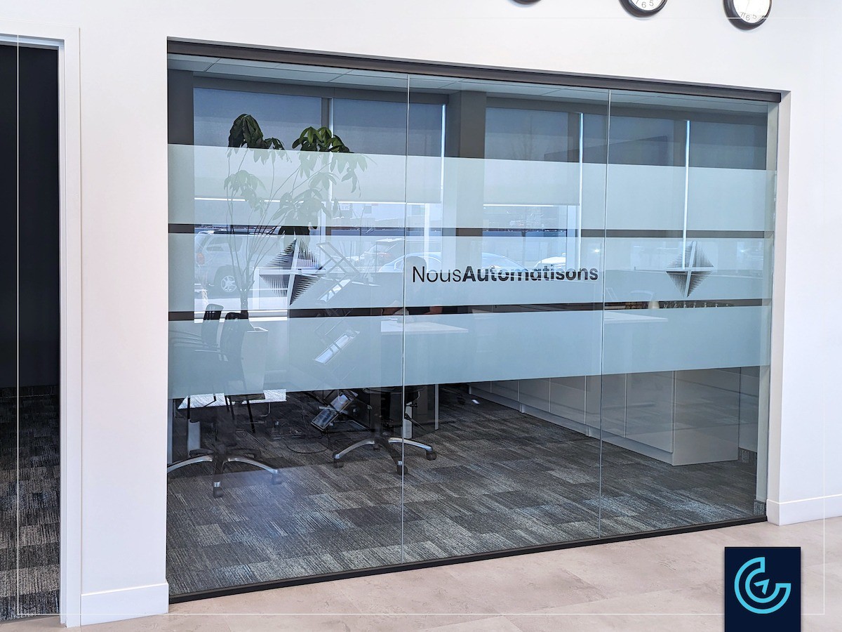 Frosted vinyl graphics designed, cut and installed for the new offices of the industrial equipments supplier Proax Technologies.