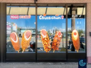 Promotional storefront window graphics designed, printed and installed for the Korean corndog store Chungchun in Terrebonne.