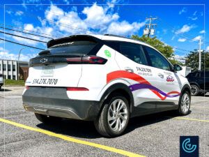 Vehicle lettering on a electric hatchback sedan 2023 Chevrolet Bolt EUV for the Montreal driving school ABC.