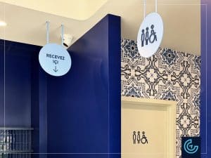 Restaurant branding wall graphics and directional signages printed and installed for the Portuguese-style cuisine restaurant franchise Emilia, branch in Ville Saint-Laurent.