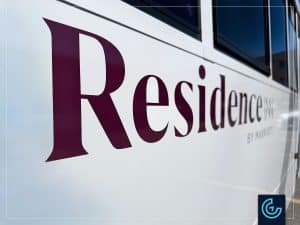 Shuttle bus lettering on a 26-seat bus body for the Montreal Airport Marriott In-Terminal Hotel.