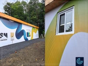 Custom wood trailer wrap in matte vinyl banners for the “Sales office” of the new residential housing project Quartier 4 Saisons by the construction company Groupe Houde.