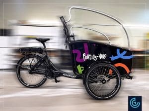 Habillage sur mesure d'un vélo cargo électrique, model Winther Cargoo, pour le projet Pratico Vélo par Dumoulin Bicylettes.