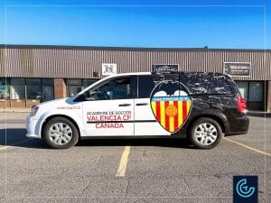 Vehicle partial wrap and lettering on a minivan 2015 Dodge Caravan Passenger for the academy soccer Valencia CF Canada.