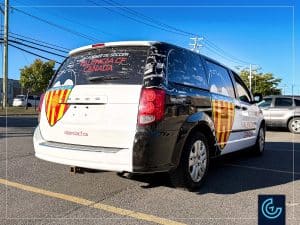 Vehicle partial wrap and lettering on a minivan 2015 Dodge Caravan Passenger for the academy soccer Valencia CF Canada.