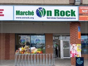 Conception, impression et installation de graphiques vitrine et d'une enseigne devanture rénovée pour le marché communautaire et la banque alimentaire OnRock à Pierrefonds-Roxboro.