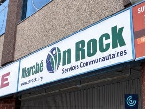 Storefront window graphics and refurbished sign designed, printed and installed for the community services and food bank market OnRock in Pierrefonds-Roxboro.