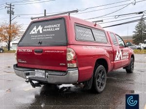 Pickup truck lettering on a 2015 Toyota Tacoma Extended Cab with a Fibrotech toolbox for the landscape lighting designer and carpenter Ambiance McMullan.