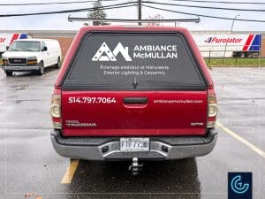 Pickup truck lettering on a 2015 Toyota Tacoma Extended Cab with a Fibrotech toolbox for the landscape lighting designer and carpenter Ambiance McMullan.