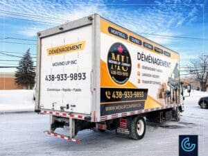 Habillage et lettrage d'un camion cargo Isuzu NRR avec une boîte de transport de 20 pieds pour Déménagement Moving Up Company.