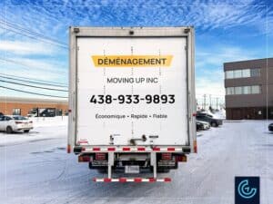 Habillage et lettrage d'un camion cargo Isuzu NRR avec une boîte de transport de 20 pieds pour Déménagement Moving Up Company.