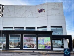 Temporary window graphics to announce the upcoming team action game Héros designed, printed and installed for the rock climbing gym center Clip 'n Climb in Champlain Mall.