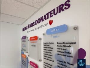 Custom donor recognition wall and directional wall graphics designed, printed and installed for the social services organization AIDI (Action Intégration en Déficience Intellectuelle) in Brossard.